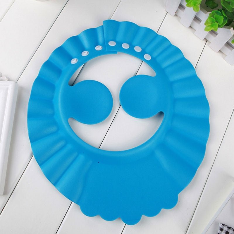 Visière chapeau pour douche bébé I ShampooCap™ - baby-phoque